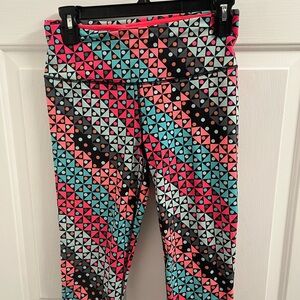 Victoria's Secret Pink and Blue Leggings with Vibrant Geometric Pattern